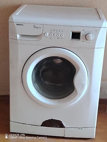 surucu yuk: Beko önyükləməli paltaryuyan maşın - Tutum: 5 kq - Enerji sinfi: AA - — 5