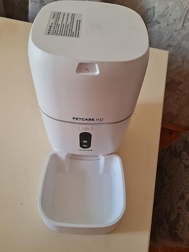 mor rəng: Ev heyvanları üçün nəzərdə tutulmuş bu avtomatik qidalandırıcı ağ — 2