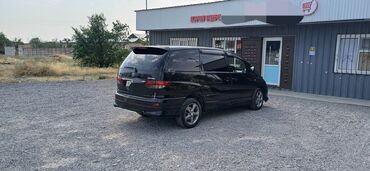 мотор камри 2.4 цена: Черный минивэн Toyota Estima с плавными линиями кузова, оснащенный