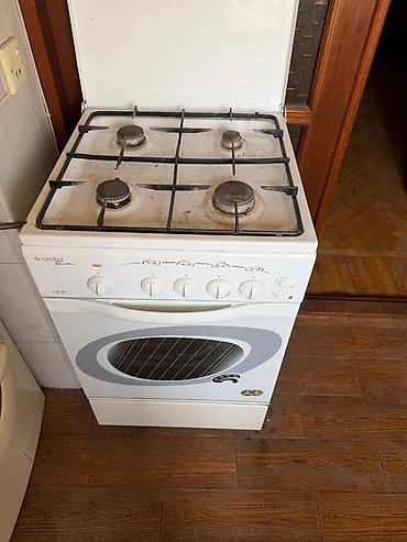mikrodalqalı soba: Gefest 3100-06 qaz plitəsi və qaz sobası - 4 qaz ocağı: 1 böyük, 2 — 1