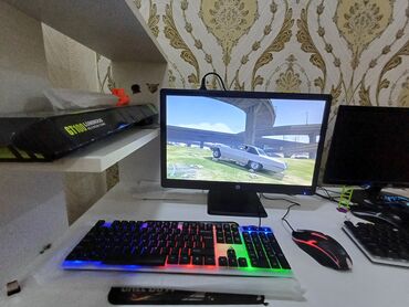 gt 710: Qara rəngli, işıqlı klaviatura və qırmızı-qara dizaynlı siçan dəsti