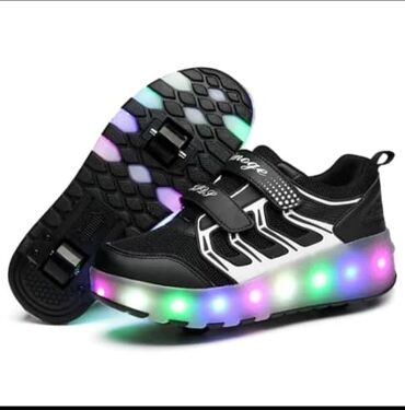 детская обув: Ролики-кроссовки новые в упаковке с подсветкой .размеры 31-37. цена