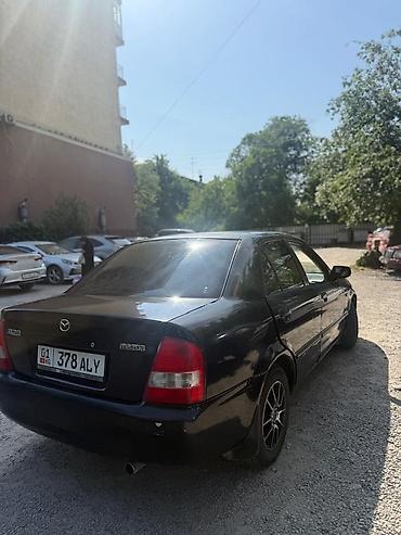 mazda mx5: Mazda 323: 2002 г., 1.5 л, Автомат, Бензин, Седан — 4