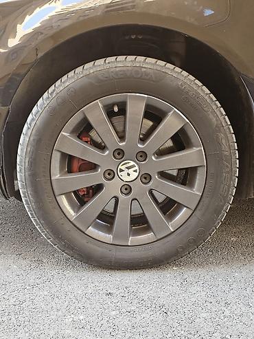 Volkswagen: Volkswagen Passat: 1.8 l | 2010 il Sedan — 25