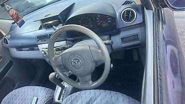 чехлы бу: Mazda Demio: 2003 г., 1.3 л, Автомат, Бензин, Хэтчбэк — 8