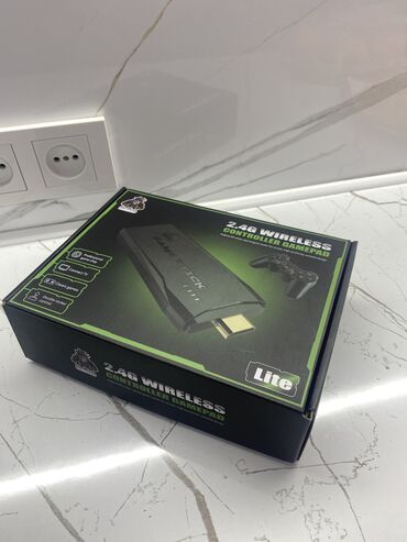 приставку: Игровая приставка «GAME STICK Lite 4K» Пользовались всего месяц