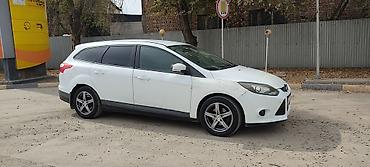 Продажа авто: Ford Focus: 2014 г., 1.6 л, Механика, Бензин, Универсал — 2