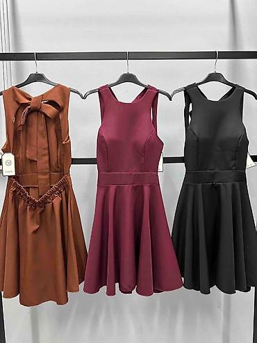 statement ogrlice: Haljina ✨ 3000 din Elegantna mini haljina A-kroja sa otvorenim leđima — 3