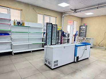 Продажа коммерческой недвижимости: Продажа магазинов В жилом доме, 66 м², Косметический ремонт, Отдельный вход, 1 этаж — 8