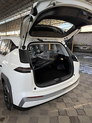 GAC: Электромобиль GAC Aion Y (белый), компактный кроссовер/минивэн с — 11