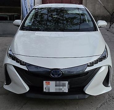 byd e2 2024: Toyota Prius: 2019 г., 1.8 л, Автомат, Гибрид, Лифтбек — 2