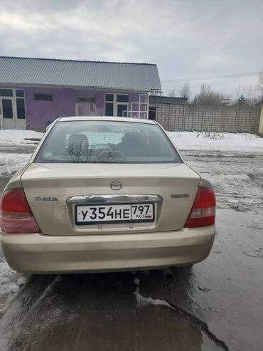 машина на час: Mazda Familia: 2005 г., 1.5 л, Автомат, Бензин, Седан