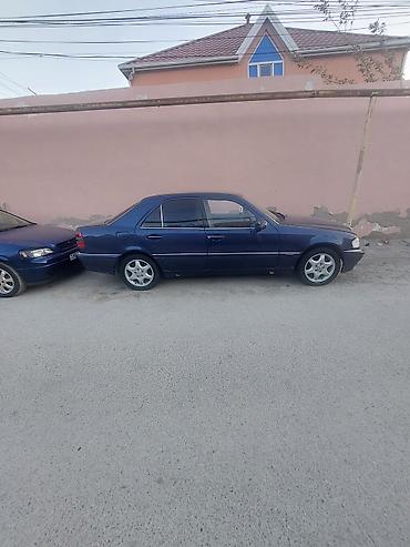 mersedes a klas: Mercedes-Benz C-Sinif sedan (W202), tünd mavi rəng. - Kuzov: 4 qapılı — 3