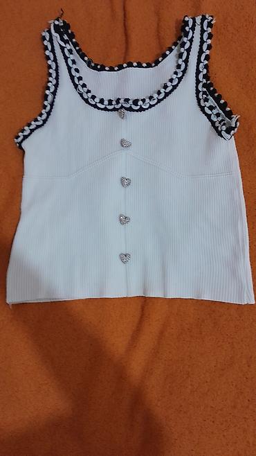 Ağ rəngli qadın cropu/top - Qolsuz, qalın rezinli trikotaj/parça