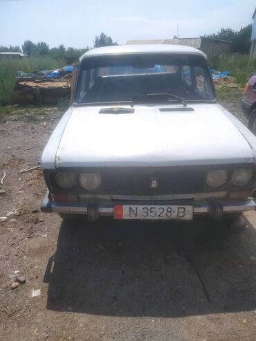 купить запчасти на опель вектра б: Классический седан "Жигули" белого цвета, известный своей надежностью