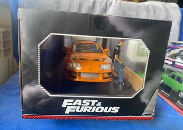 Avtomobil modelləri: Коллекционная модель Toyota Supra A80 Orange 1995 Jada Toys Art — 2