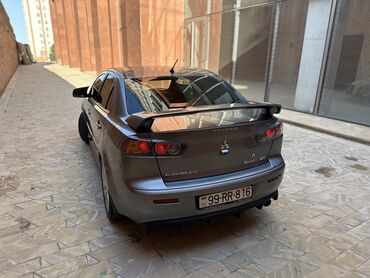 Mitsubishi: Mitsubishi Lancer: 2 l | 2013 il 199000 km Sedan — 9