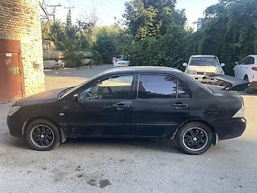 мотор на лансер: Mitsubishi Lancer: 2005 г., 1.6 л, Автомат, Бензин, Седан — 3