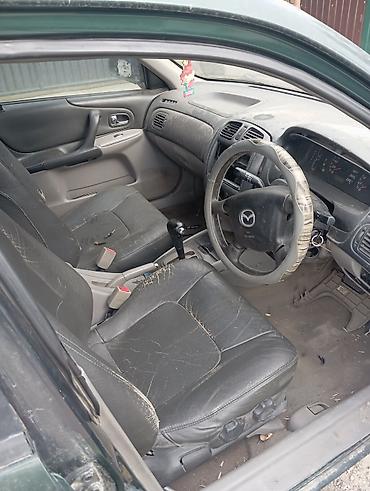 номера рф: Mazda 323: 2013 г., 1.5 л, Автомат, Бензин, Седан — 5