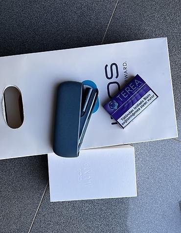 ən yaxşı elektron siqaret: IQOS ILUMA elektrikli tütün isidici cihaz dəsti Məhsulun tərkibi: - — 2