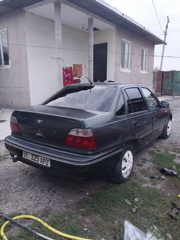 7 местная машина: Daewoo Nexia: 2003 г., 1.5 л, Механика, Бензин, Седан