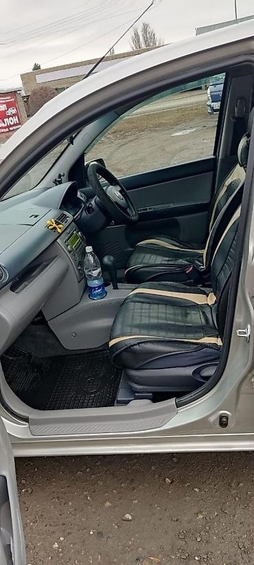 Mazda: Mazda Verisa: 2003 г., Автомат, Бензин, Хэтчбэк — 8