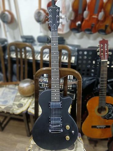 qarmon satışı: Təzə elektro gitara — 1