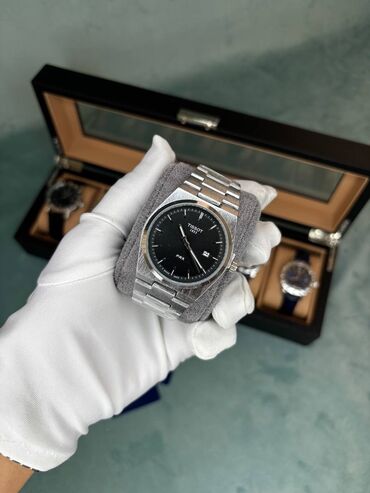 свадебное платье и аксессуары: 🔹 Особенности часов Tissot PRX: 	•	Дизайн: современный и