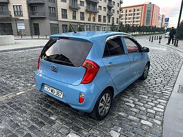 spoiler satisi: Kia Morning, mavi rəng, şəhər üçün yığcam və iqtisadi hetçbek — 10