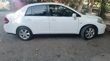 Nissan: Nissan Tiida: 1.8 l | 2011 il Sedan — 15