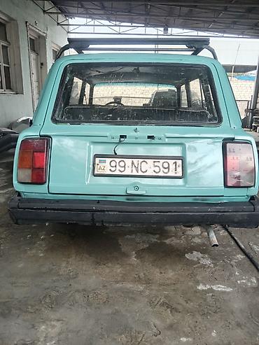 vaz oka satilir: VAZ 2104 universal kuzovlu minik avtomobil. Maşın açıq yaşıl rəngdədir — 3