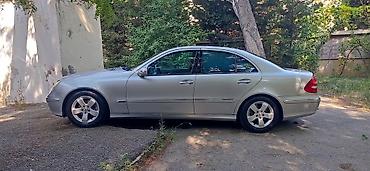 met: Mercedes-Benz E-Class: 2.6 l | 2002 il Sedan — 4