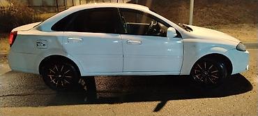 Daewoo: Daewoo Gentra: 1.5 l | 2014 il Sedan — 4