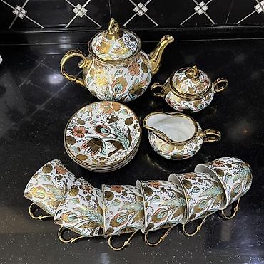 dekor agaclar: Porcelain çay dəsti – zərif qızılı naxışlı Tərkibi: - Çaydan — 1