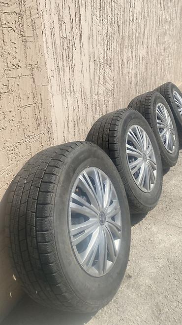 tir: Комплект из 4 зимних колес в сборе: шины + оригинальные колпаки VW. - — 3