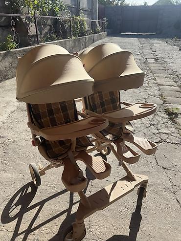 Детская прогулочная коляска для двойни (side-by-side)