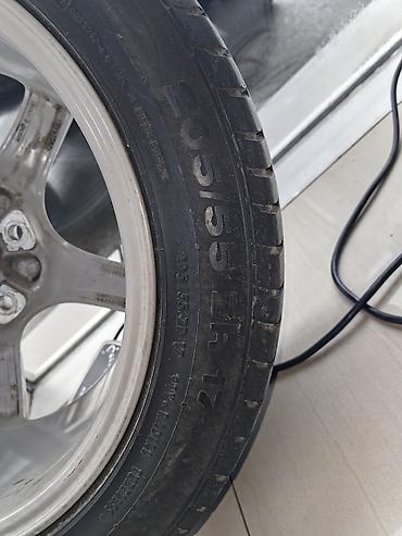 porsche disk: Məhsul: Porsche loqolu yüngül lehimli disk + Continental şin komplekti — 5