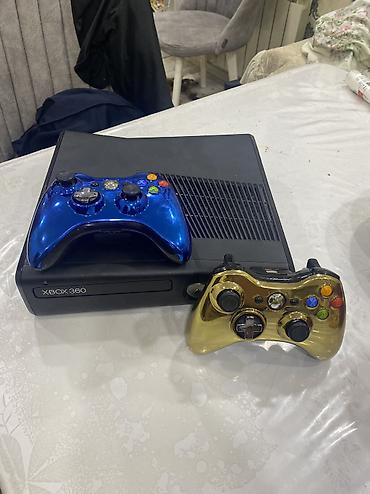 Xbox 360 slim prosivkali ici dolu oyunla cox yaxsi veziyetde ustunde 2