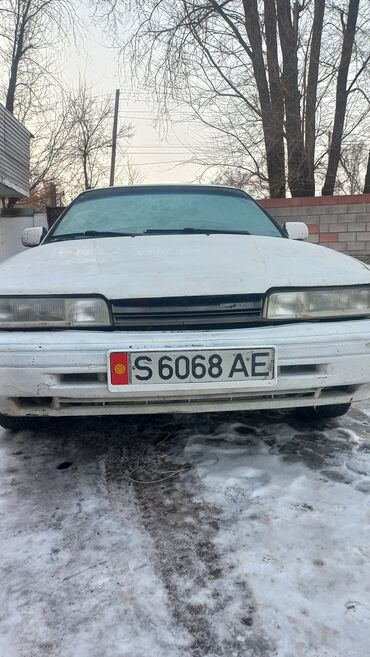 для салона авто: Mazda 626: 1990 г., 2 л, Механика, Бензин, Внедорожник