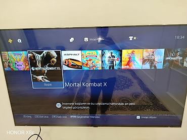 oyun direksiyonu: PlayStation 4 Pro oyun konsolu. Əla vəziyyətdə, 2 orijinal pultla - — 6