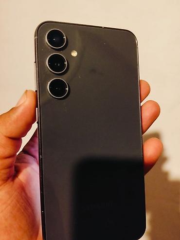 смарт тв: Samsung Galaxy S23 FE, 128 ГБ, цвет - Черный, Гарантия — 1