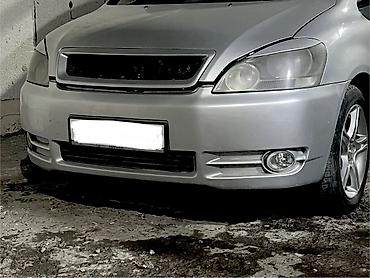Продаю Передний бампер для Toyota в серебристом цвете, в сборе с
