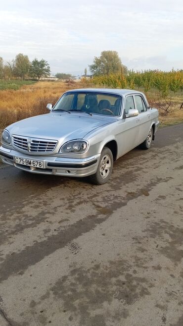 авто с пробегом фольксваген: GAZ Volga 31105 sedan, gümüş rəng. - Kuzov: 4 qapılı, klassik Volga