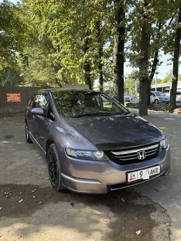 климат одиссей: Минивэн Honda Odyssey серого цвета, идеально подходящий для семейных