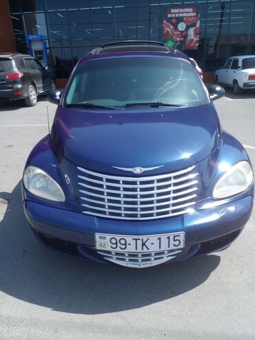 Göy rəngdə olan Chrysler PT Cruiser avtomobili. Avtomobilin salonu bej