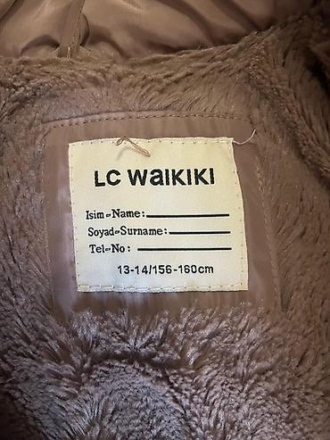 купить плащ: LC Waikiki qız uşağı üçün qış plaşı - Model: kapüşonlu, süni kürk — 1