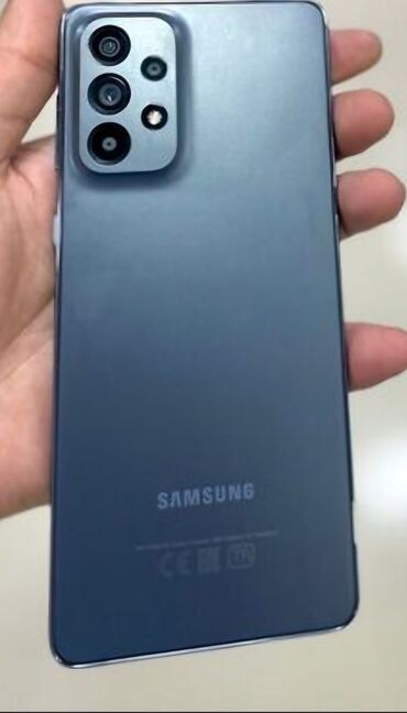samsun a12: Samsung Galaxy A73, 128 ГБ, цвет - Серый, Отпечаток пальца, Face ID