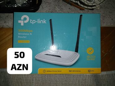 бу телефоны: TP-Link şirkətinin 300 Mbps sürətli simsiz N routeri. Ağ rəngdə olan