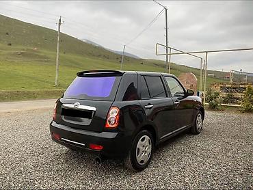 LIFAN: Lifan 320, 5 qapılı kompakt hetçbek. Xarici: - Qara rəng, xrom qapı — 4