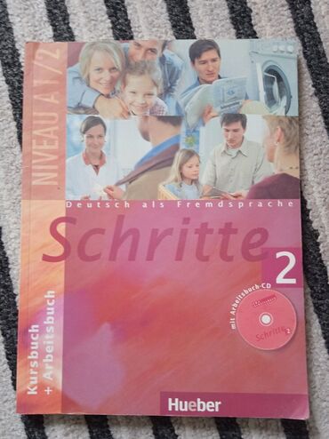 Книги, журналы, CD, DVD: Schritte 2 учебник немецкого языка + рабочая тетрадь
Уровень А1/А2